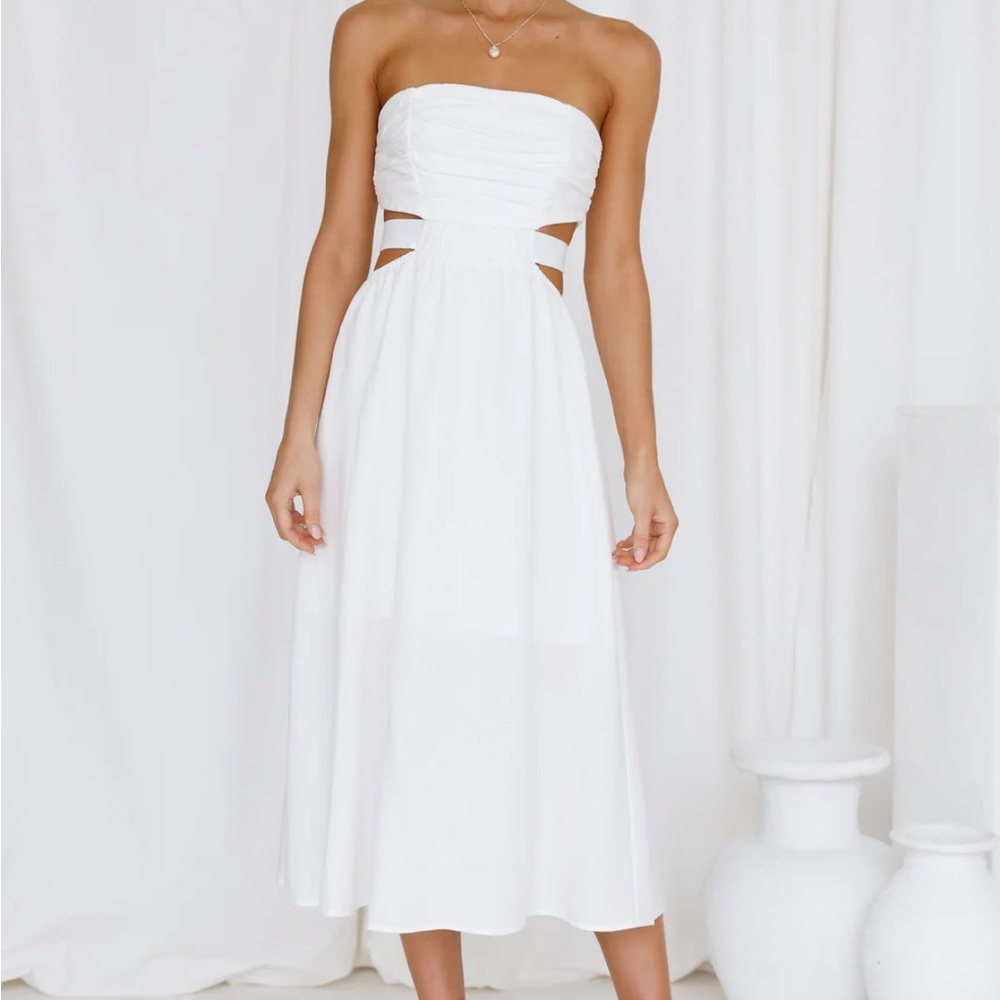 Strapless white flowy dress with cutouts!